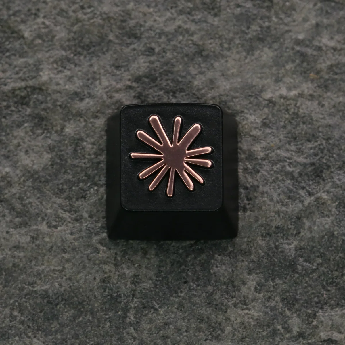 A premium Claude AI & Mascot Clawd keycap, crafted from zinc alloy, displayed from a distinct angle, highlighting its intricate details.