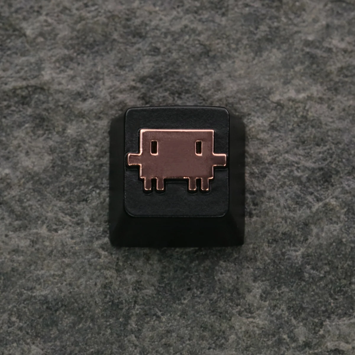 A detailed close-up of the Claude AI & Mascot Clawd keycap, showcasing its intricate zinc alloy craftsmanship and premium metallic.
