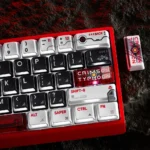 Crimson Typhoon Cherry Keycap Set. Detailed views of the nuclear mecha aesthetic, crimson glow, and transparent legends.