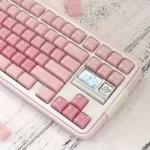 Playful CSA Blueberry keycap set showcasing its vibrant, translucent blue jelly pudding aesthetic and ergonomic profile for comfortable typing.