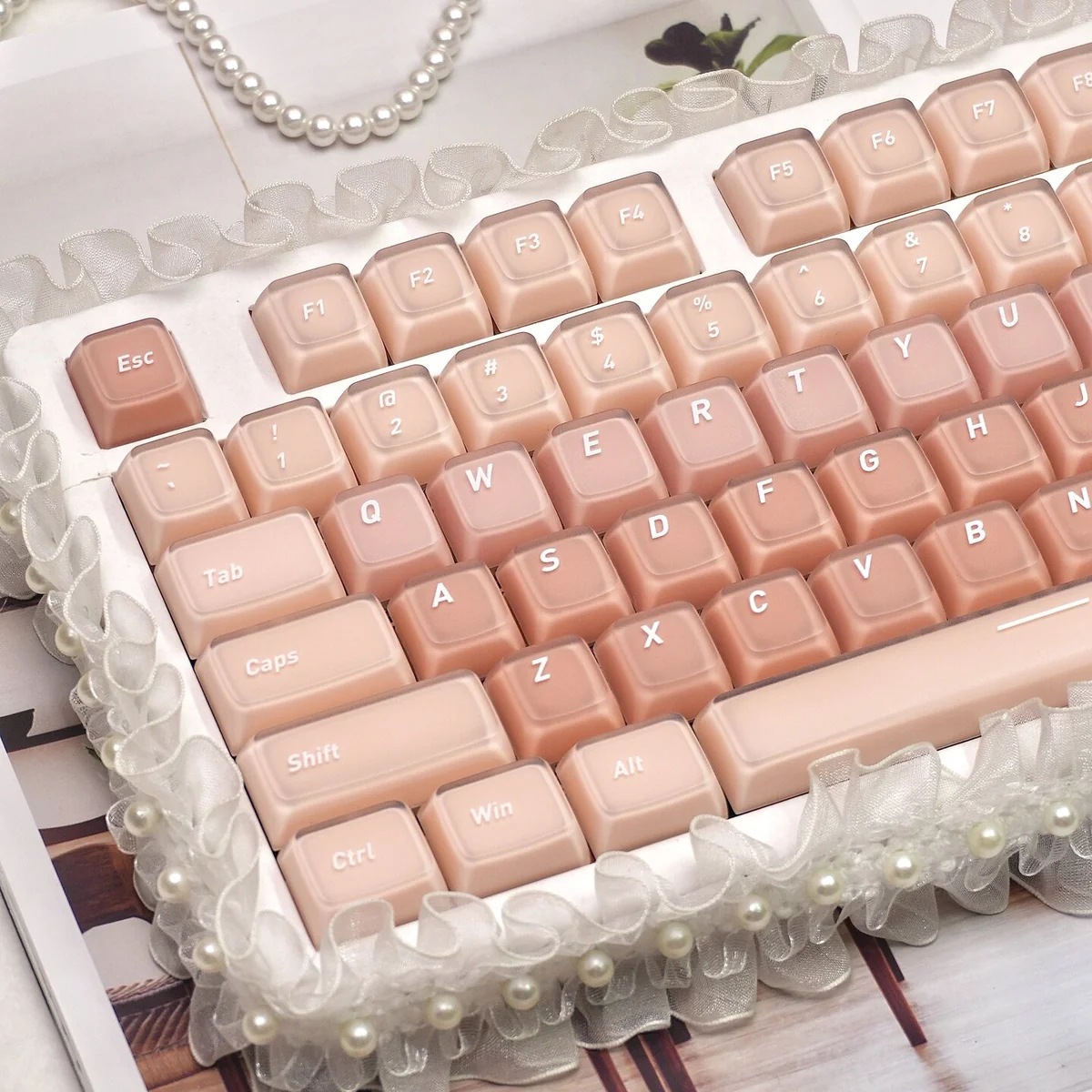 Liquid Foundation CSA keycaps. Pastel cosmetic-dessert themes, ergonomic spherical contours, seen from multiple angles.
