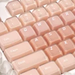 Detailed view of the Liquid Foundation CSA keycaps, highlighting their unique cosmetic and dessert-inspired pastel hues and smooth, ergonomic design.