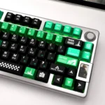 Detailed product gallery image showcasing the rugged Delta Force Tactical Metallic PBT Keycaps from various angles, highlighting their premium finish.