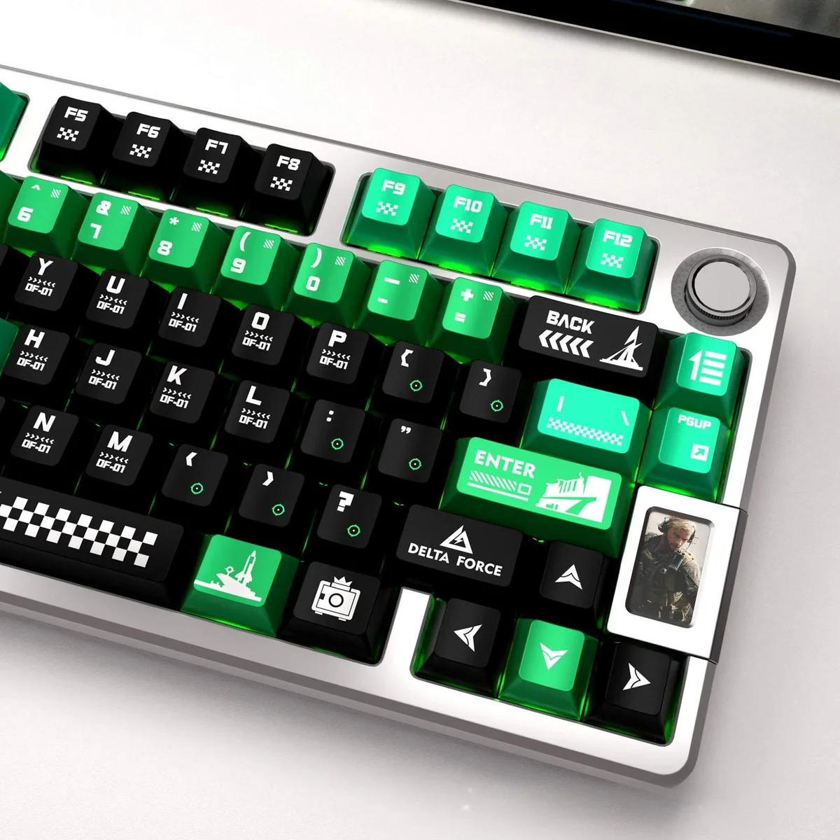 Detailed product gallery image showcasing the rugged Delta Force Tactical Metallic PBT Keycaps from various angles, highlighting their premium finish.