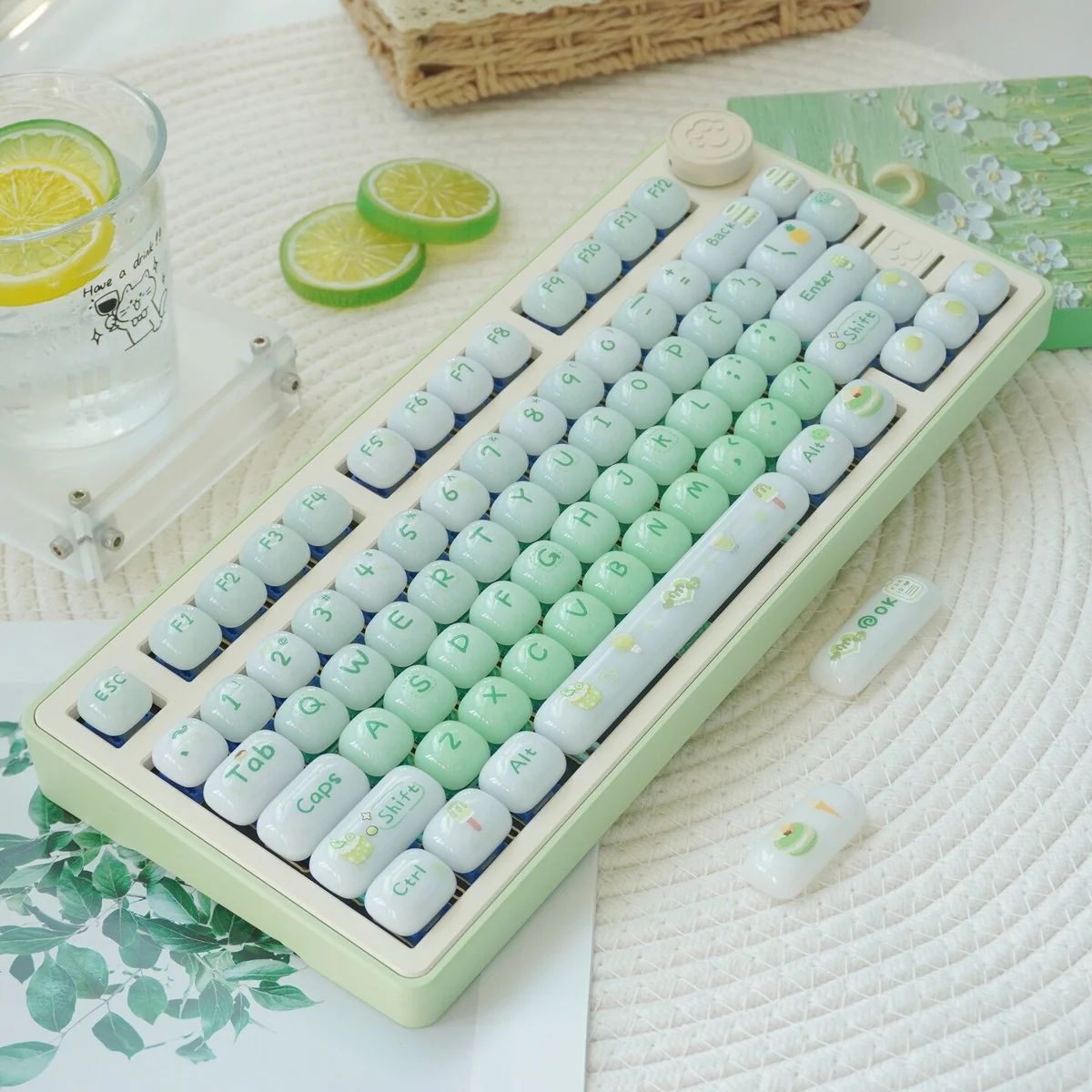 Sweet Nostalgia Dessert Keycap Set. Glossy PC keycaps, lush gradient green, rounded, dessert-inspired design, and a playful, jelly-like finish.