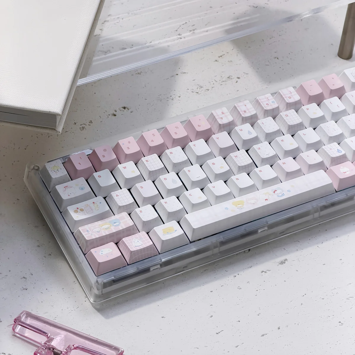 Close-up of a whimsical Fairy Garden keycap set, showcasing charming storybook illustrations and pastel hues that evoke childhood wonder.