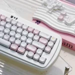A whimsical Fairy Garden keycap set displayed from various playful angles, showcasing charming storybook art and soft pastel hues, inspiring childhood wonder.
