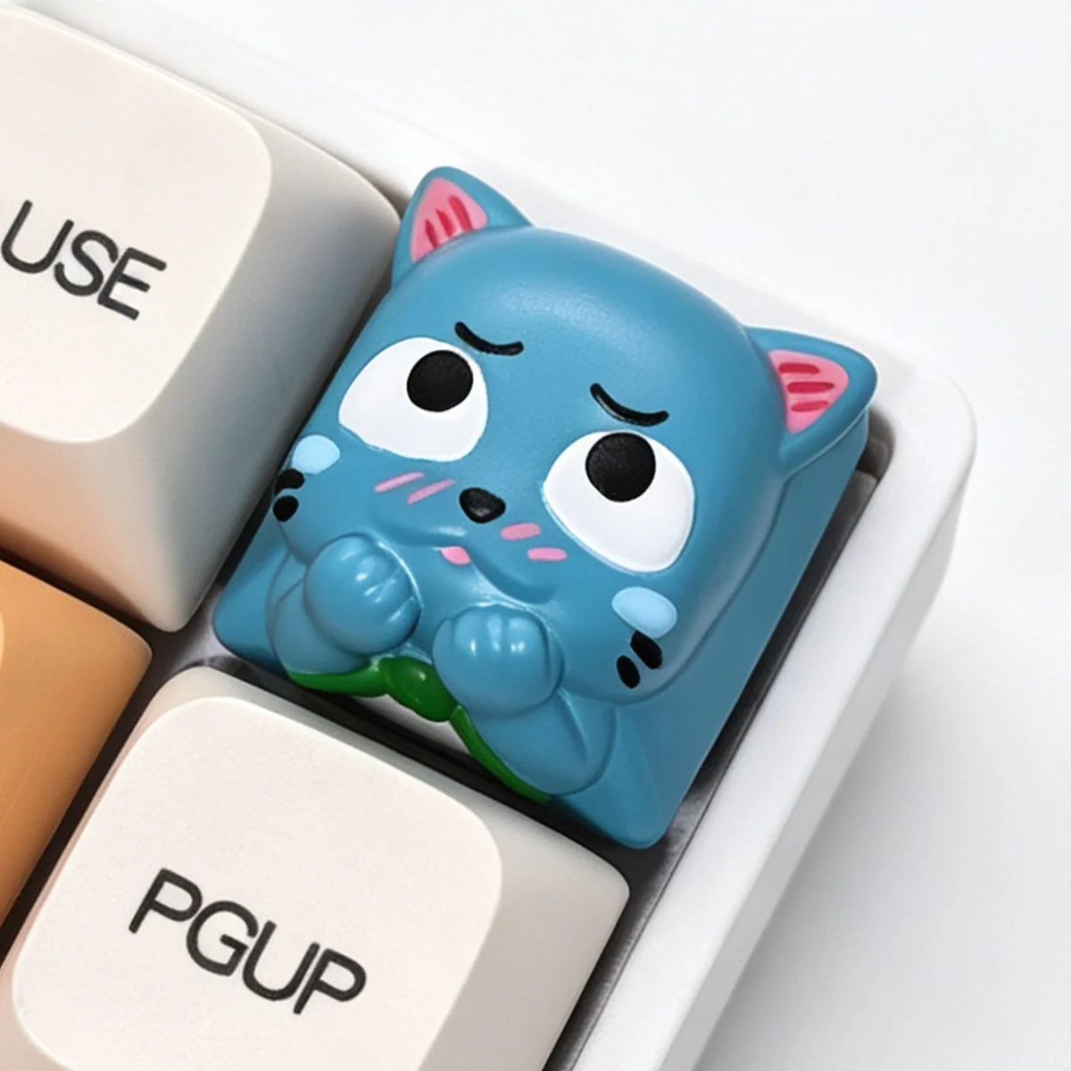Handcrafted Fairy Tail Happy resin keycap from a unique angle, highlighting its vibrant 3D details and playful design for a joyful keyboard.