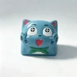 Handcrafted Fairy Tail Happy resin keycap from multiple angles, showcasing its vibrant 3D details and playful design for joyful keyboards.