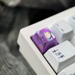 Premium Fern titanium artisan keycap, captured from multiple angles, reveals vibrant character art on polished titanium, a timeless journey collection.