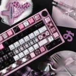 Angled view of an exquisite ceramic keycap set. Smooth pastel pink and blue keycaps with a delicate, glossy finish evoke first love nostalgia.