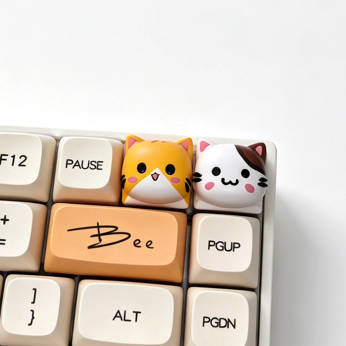 Angled view of the exclusive FMA Kitten artisan keycap, showcasing its intricate resin artistry and detailed armored cat motif inspired.