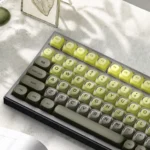 Enchanting Forest Keycap Set: mechanical keycaps with serene nature patterns, tranquil greens, earthy tones, for an immersive forest theme.