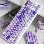 Vibrant Genshin Impact Citlali PBT keycap set, an exclusive collectible featuring intricate character designs and the Teyvat Portal aesthetic.