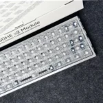 Close-up of Glacier Crystal Top-Printed PC Keycaps set, showcasing its sleek, transparent, crystal-like finish from various angles.