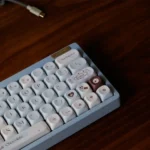 A gallery of Gourmet Sea Salt Choco MOA Keycaps, showcasing their warm, inviting texture and rich chocolate hues from various angles.