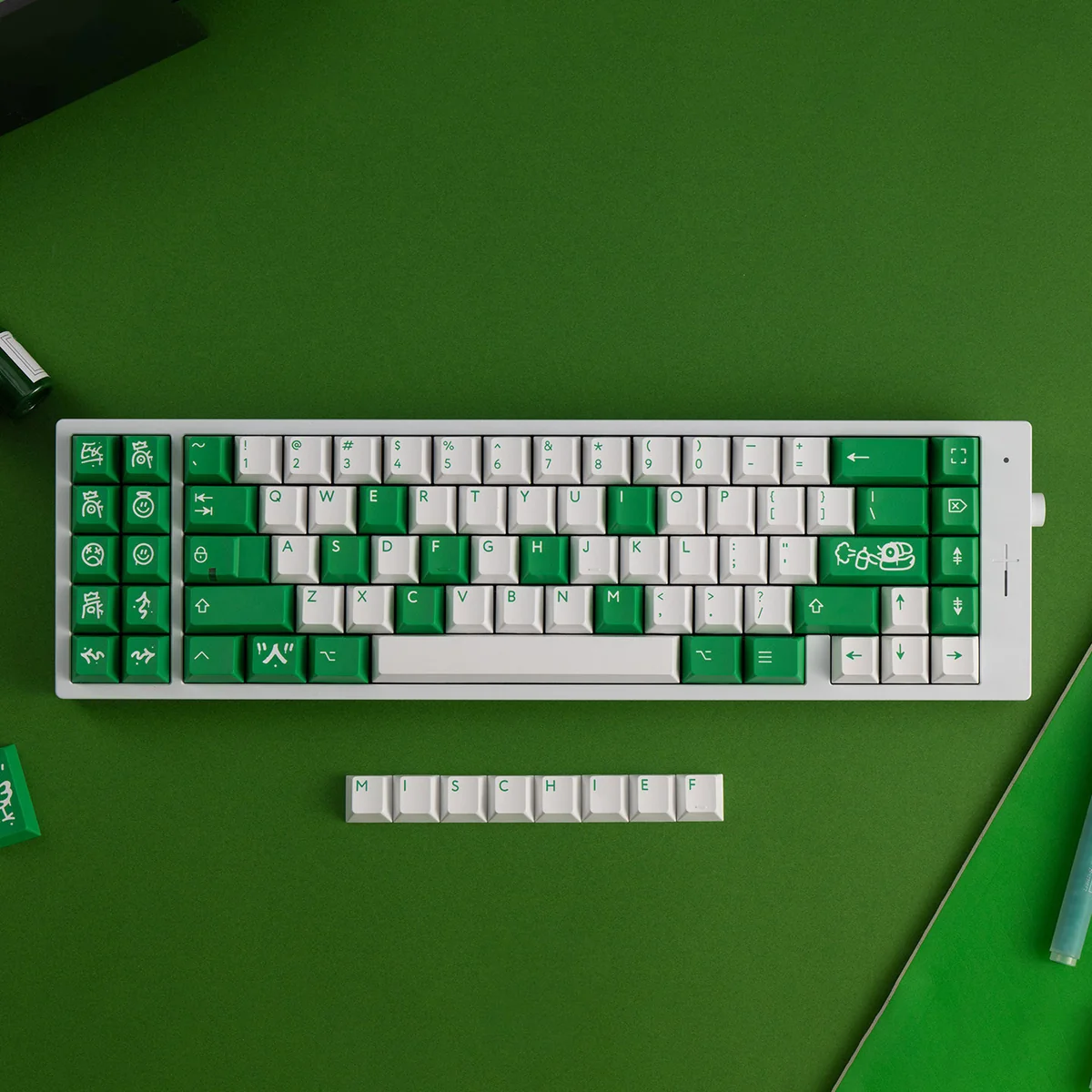 Vibrant green Mischief Keycaps set, crafted from durable double-shot ABS, showcasing playful custom legends for an energetic keyboard aesthetic.