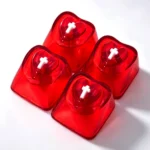 Four vibrant purple translucent heart-shaped keycaps, glowing beautifully with a polished, luminous finish for expressive mechanical keyboards.