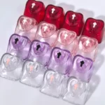 Luminous heart keycaps for mechanical keyboards, featuring vibrant, polished, translucent designs that glow with personalized charm.