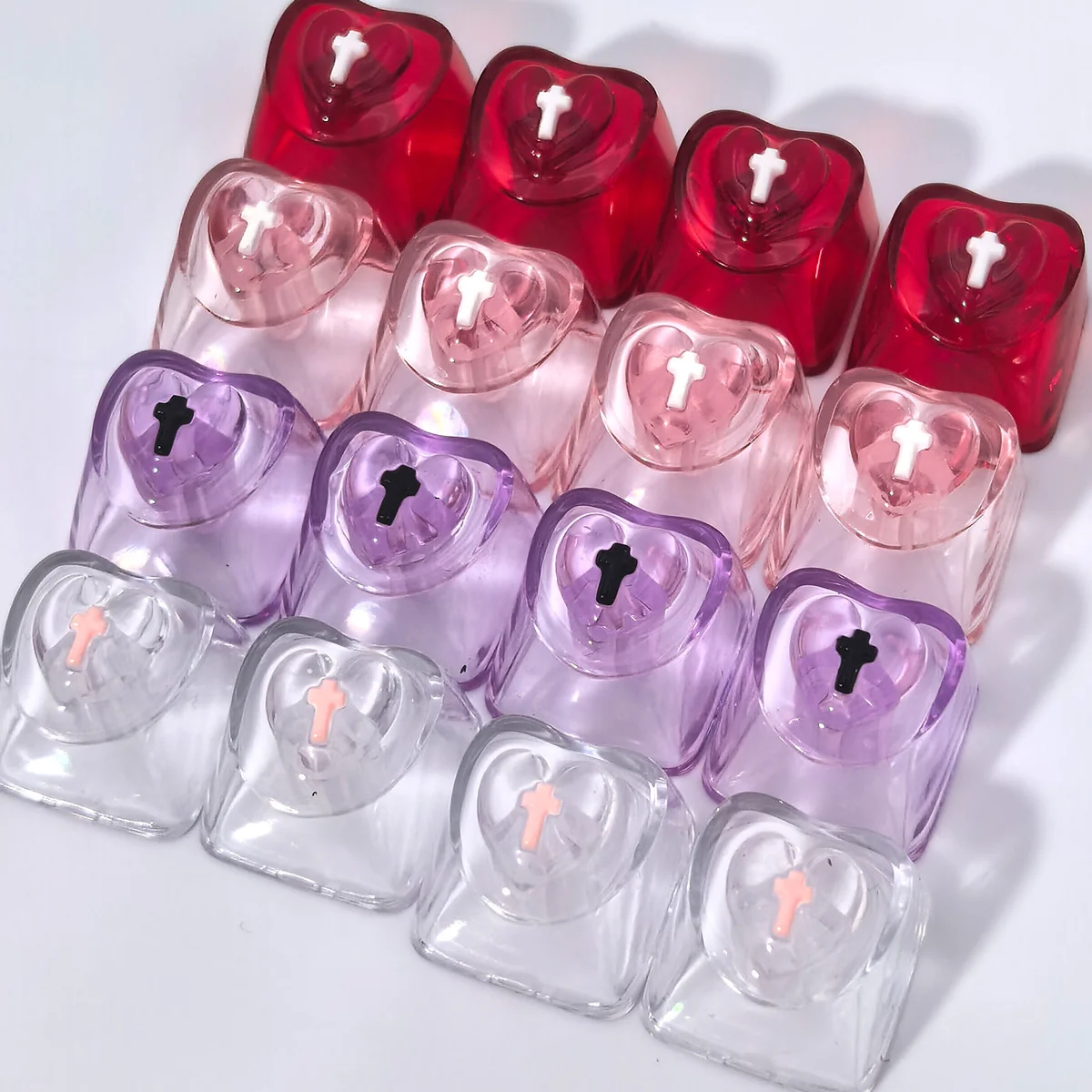 Luminous heart keycaps for mechanical keyboards, featuring vibrant, polished, translucent designs that glow with personalized charm.