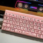 Cute Hello Kitty MDA jelly keycap set, displayed from various angles, with playful semi-translucent pink and white designs for a charming keyboard.