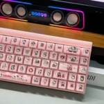 Playful Hello Kitty MDA jelly keycaps in soft pink and white, featuring a cute semi-translucent design from multiple angles, adding charm to your keyboard.