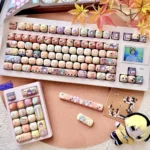 Gallery of the Hikaru no Go Hand of God PBT keycaps, showing artistic character and Go board designs from various angles.