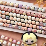 Multiple angles of the exclusive Hikaru no Go 'Hand of God' PBT keycap set, showcasing iconic anime characters and Go board aesthetics with artistic.