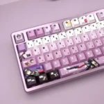 Hitachi Mako translucent PBT keycaps gallery, featuring vibrant anime art and dynamic RGB backlighting. See the unique charm from multiple angles.