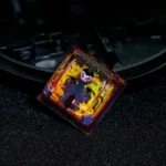 Artisan Hollow Knight Troupe Master Grimm SA R1 keycap, showcasing intricate character detail and vibrant transparent resin from multiple angles.