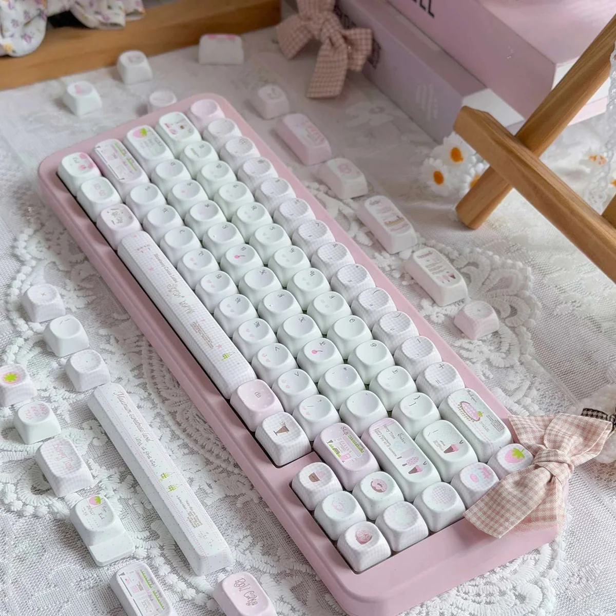Close-up shots reveal the charming pink MOA profile Ice Cream Shop Keycaps, featuring delightful dessert motifs and their durable PBT build.