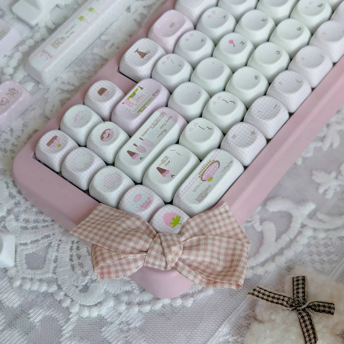 Adorable pink Ice Cream Shop Keycaps, a durable PBT MOA set, are shown from various angles. Whimsical dessert themes create a charming ice cream shop vibe.