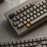 Keystone Keycaps product gallery. Multiple angles reveal the luxurious glass microbead skin-like texture and elegant, minimalist design.