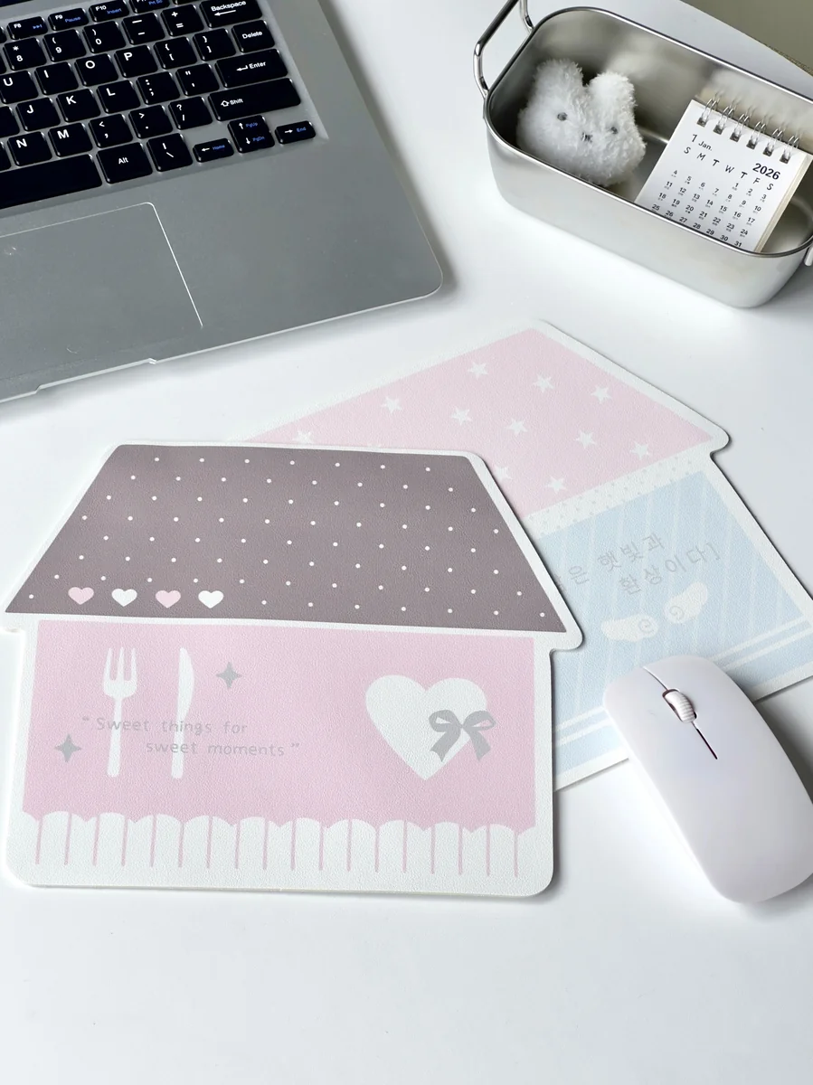 A charming, whimsical Korean house mouse pad, featuring pastel-toned illustrations of a cozy urban landscape. Offers anti-slip comfort for your desk.