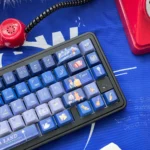 Dreamy La La Land gradient translucent PBT keycaps. Vibrant, artistic colors inspired by cinematic sunsets and dreamy cityscapes, shown from multiple angles.
