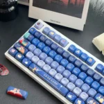 Dreamy La La Land MOA opaque PBT keycap set, displaying vibrant gradient colors echoing cinematic sunsets across 120 keys.