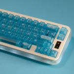 Gungnir Blue Keycaps: Legendary translucent ABS set, showcasing ethereal blue transparency from multiple artistic angles, evoking Norse elegance.