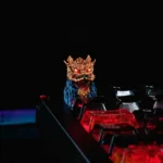 Handcrafted Lion Head of Opulence Keycap, vibrant and intricately detailed, inspired by Black Myth Wukong, displayed from an artistic angle.
