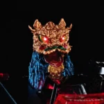 Close-up of the vibrant, handcrafted Lion Head of Opulence Keycap, revealing intricate Black Myth Wukong inspired details from a dynamic angle.