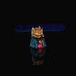 Handcrafted Lion Head of Opulence Keycap, intricately detailed with vibrant Black Myth Wukong aesthetics, presented as unique artisan desk art.