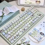 Exclusive Love and Deepspace Zayne & Rafayel & Xavier PBT keycaps. Smooth jade-like finish, elegant character designs, romantic aesthetics, showcasing premium art.