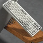 Luna Grid98 tri-mode mechanical keyboard in a gallery view, highlighting its sleek, modern design, vibrant RGB.
