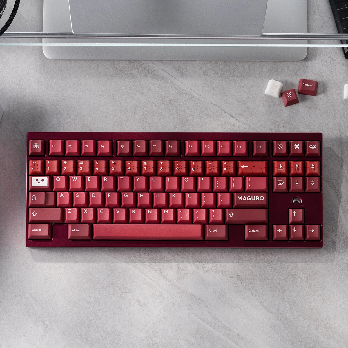 Premium doubleshot Maguro Tuna PBT Keycaps displayed, showcasing the iconic red, white, and black sushi artistry for a high-quality keyboard aesthetic.