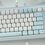 Detailed shot of the whimsical MAO Keycap Set, highlighting the ergonomic MAO profile and charming soft blue and white jelly cat design.