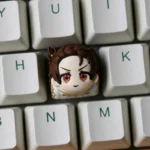 A meticulously handcrafted resin Medalist Inori Yuitsuka keycap, featuring intricate gold accents and symbolizing victory.
