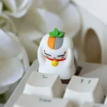 Charming Madara artisan keycap, showcased from multiple angles, highlights its vibrant anime aesthetic and exclusive handcrafted resin keycap.
