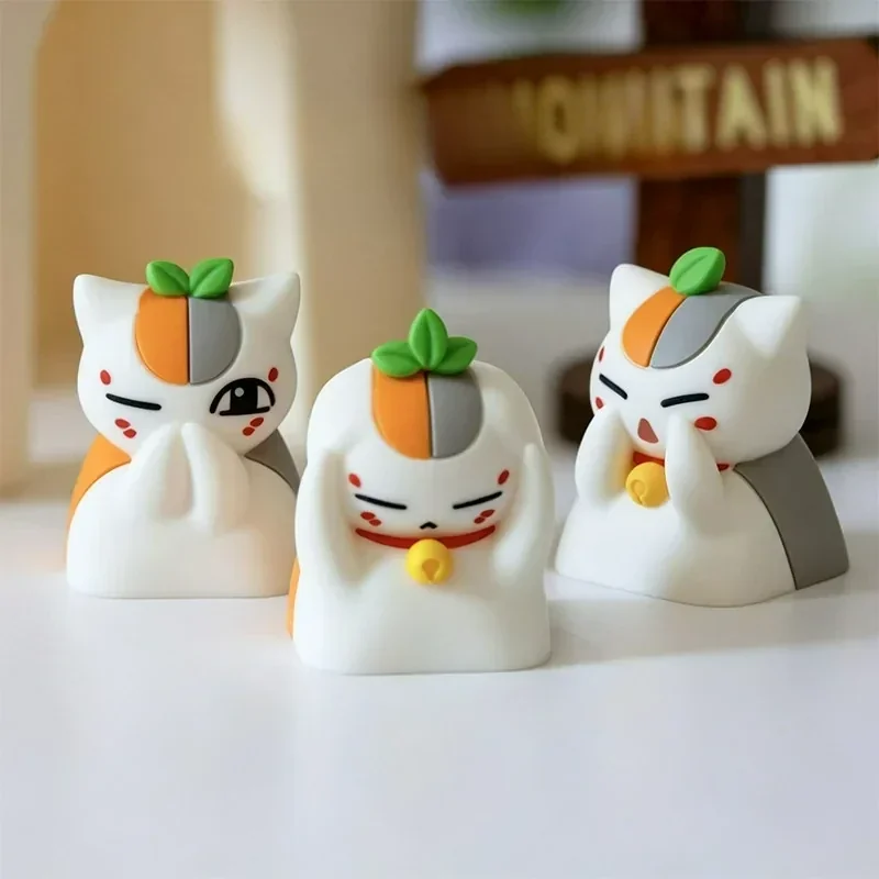 Charming Madara artisan keycap. This exclusive, vibrant anime Nyanko-sensei keycap playfully depicts him covering his eyes.