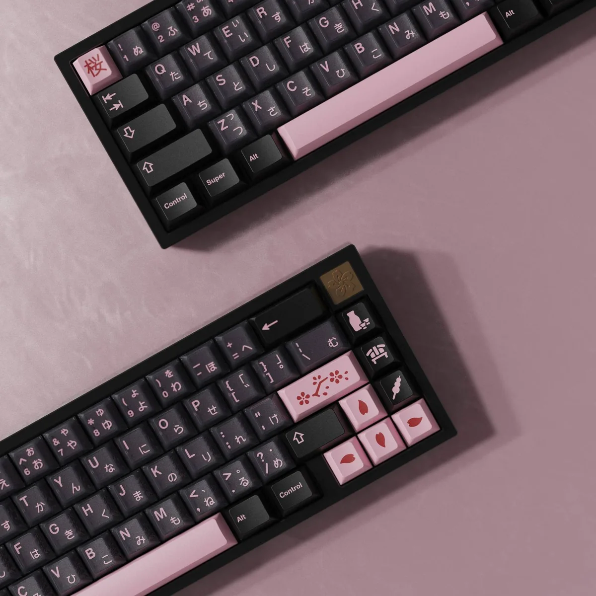 Close-up of premium Night Sakura R2 double-shot ABS keycaps, showcasing elegant deep hues and delicate pink cherry blossom accents from multiple angles.