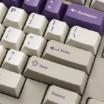 Premium Office Love Keycaps. Retro PBT dye-sub set in sophisticated grey, white, and purple, shown from various angles.
