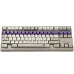 Office Love Keycaps: Premium retro PBT dye-sub keycap set in sophisticated grey, white, and purple, capturing a vintage office aesthetic.